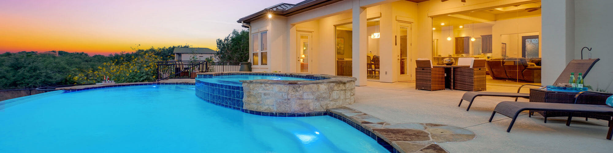 A Luxury Pool At Sunset